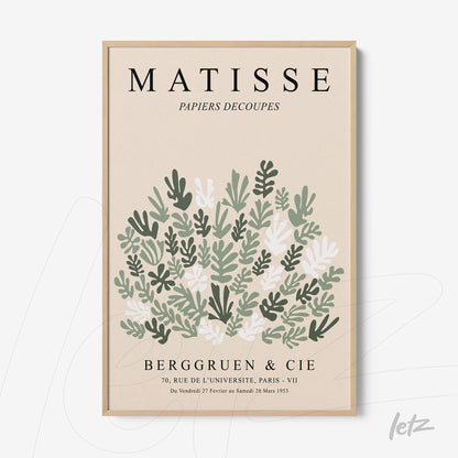 quadro com arte decorativa inspirada em Matisse, apresentando folhagens em tons verdes e finas letras pretas em moldura clara