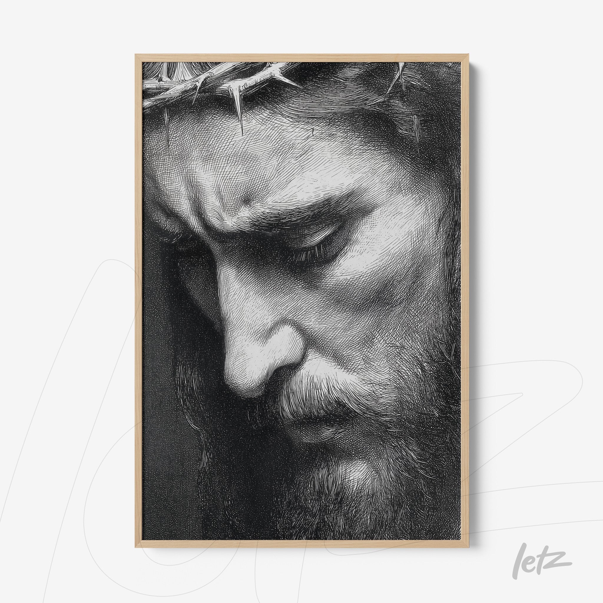 quadro com arte detalhada de um homem com expressão serena e coroa de espinhos em moldura clara