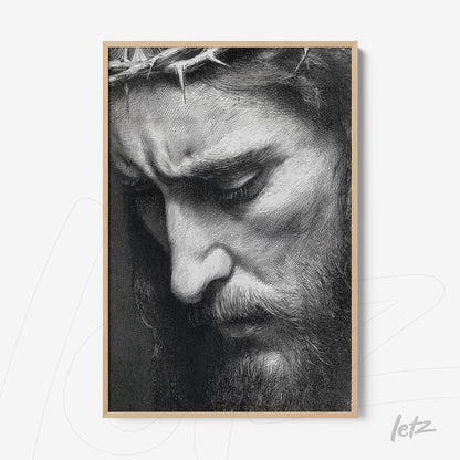 quadro com arte detalhada de um homem com expressão serena e coroa de espinhos em moldura clara