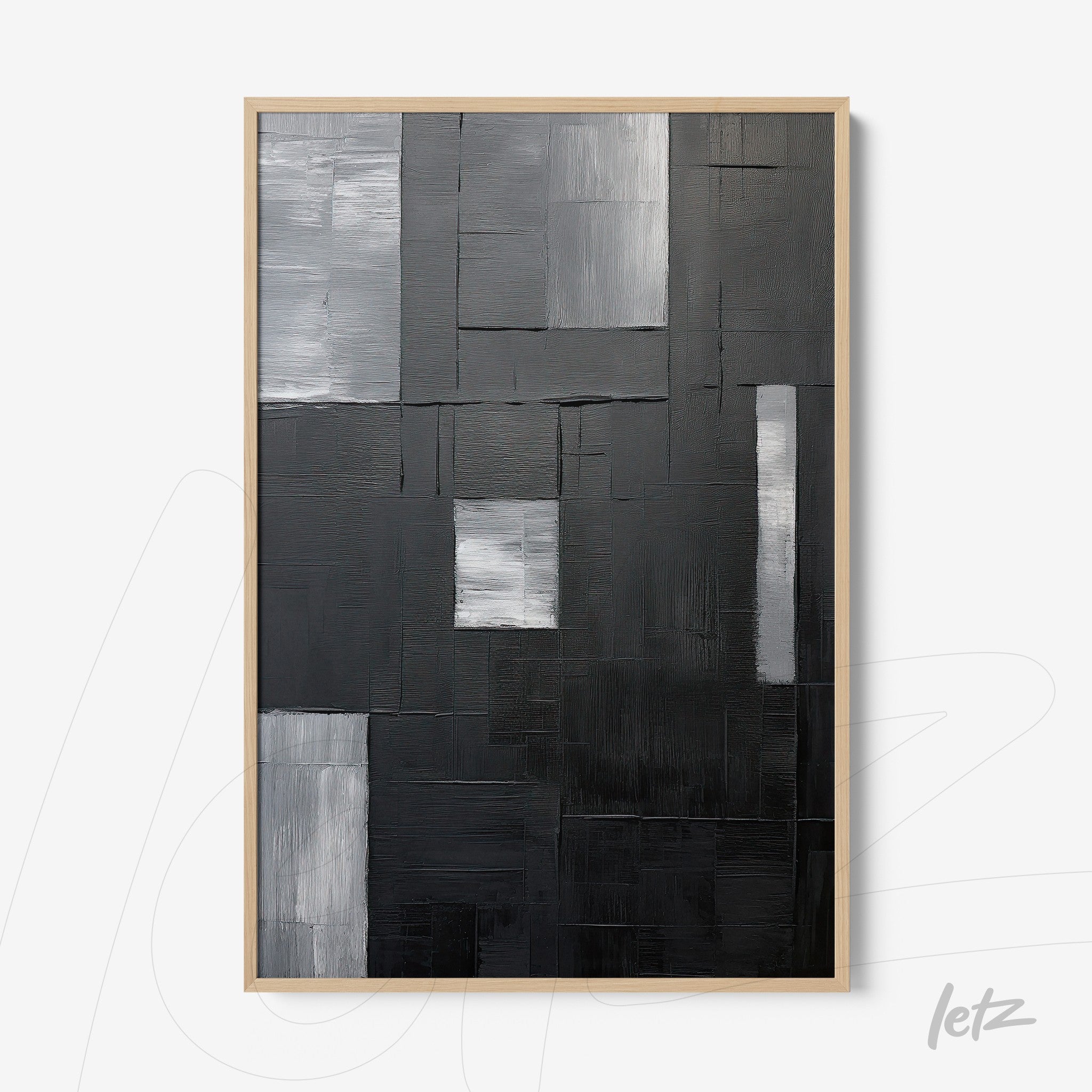 quadro abstracto em preto e branco com texturas variadas em moldura clara