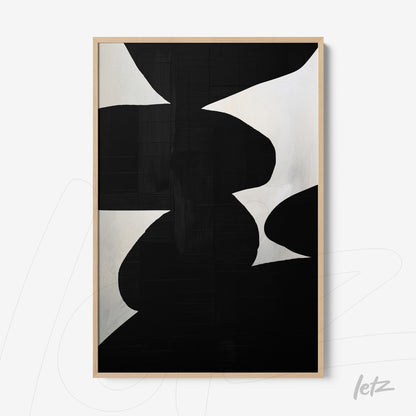 quadro com arte abstrata em preto e branco, exibido em moldura de madeira clara