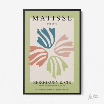 quadro com arte de Matisse em moldura preta, apresentando formas orgânicas coloridas em fundo verde claro