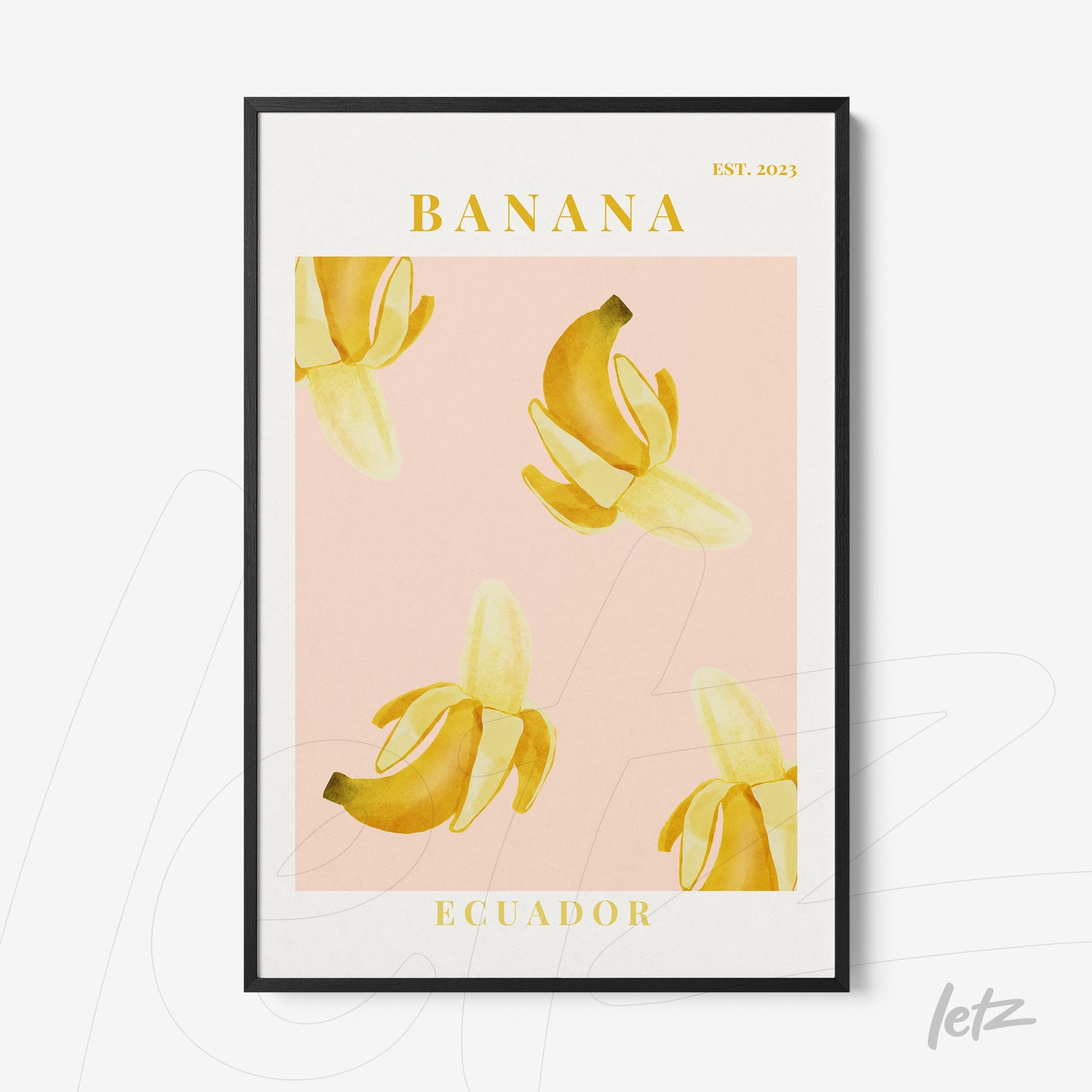 quadro com ilustração de bananas amarelas sobre fundo rosa claro, moldura preta e texto em destaque na parte superior