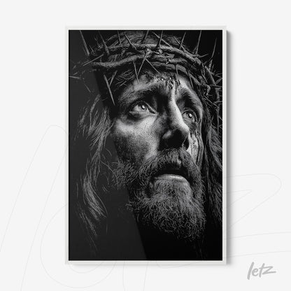 quadro em preto e branco retratando o rosto de Jesus com coroa de espinhos em moldura branca