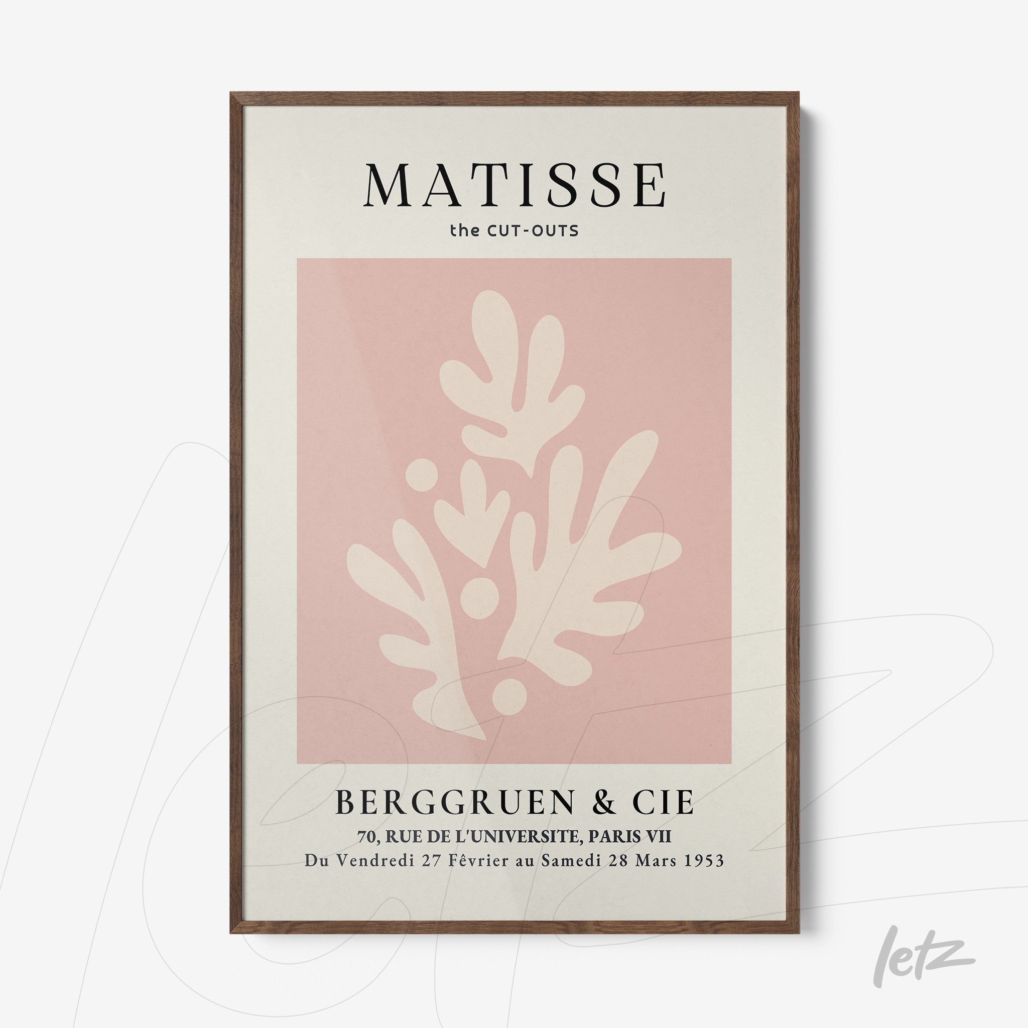 quadro com arte moderna de formas orgânicas em fundo rosa e moldura de madeira escura