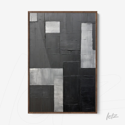 quadro abstrato em tons de preto e cinza, com textura em relevo e moldura de madeira escura