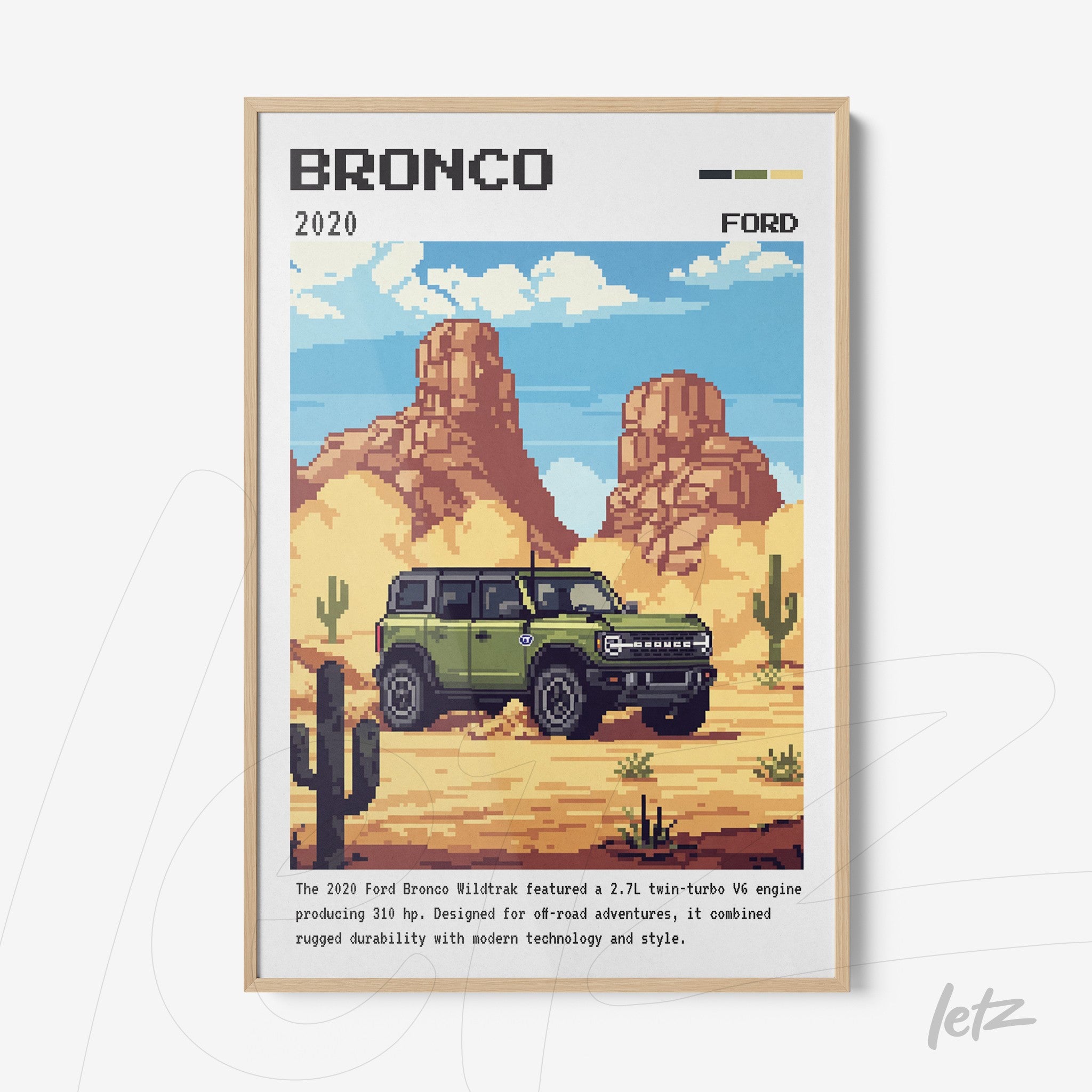 quadro com arte pixelada do Ford Bronco 2020 em moldura de madeira clara sobre fundo de deserto