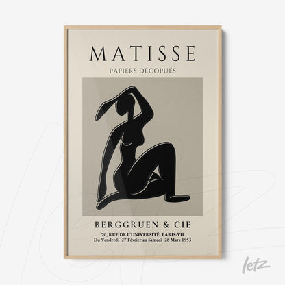 quadro com arte recortada de Matisse em moldura de madeira clara