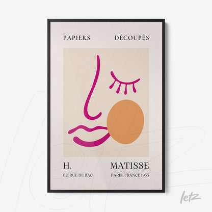 quadro com arte abstrata de rosto estilizado em tons vibrantes de rosa e laranja, moldura preta