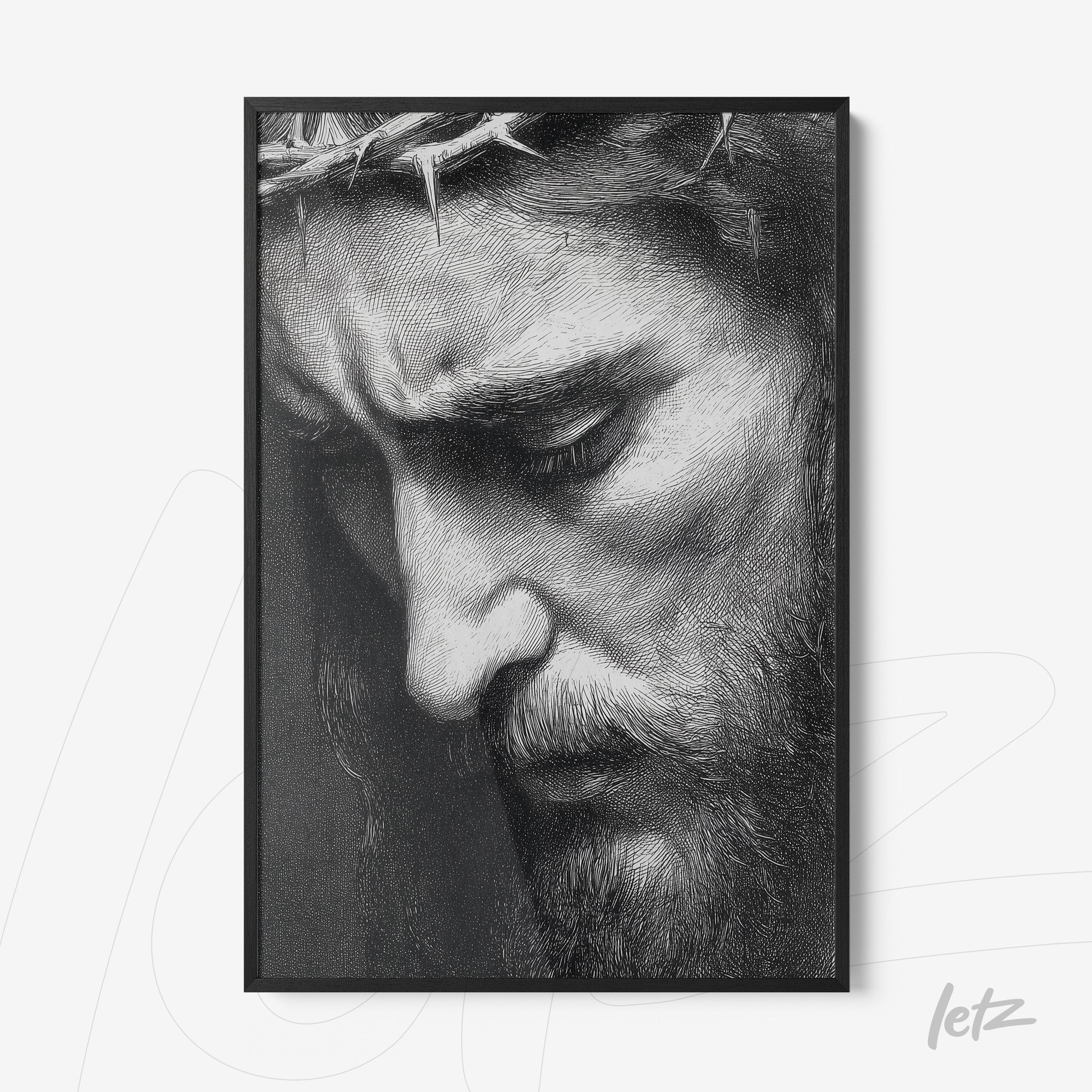 quadro com retrato em preto e branco de figura masculina com expressão pensativa e coroa de espinhos em moldura preta