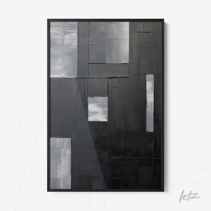quadro abstrato em preto e branco com formas geométricas sobre fundo texturizado, moldura preta