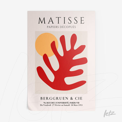 quadro decorativo com arte abstrata em cores vibrantes, destacando uma folha estilizada vermelha sobre fundo claro e círculo amarelo no canto superior